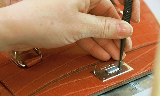 Faire une photo de sac Herm?