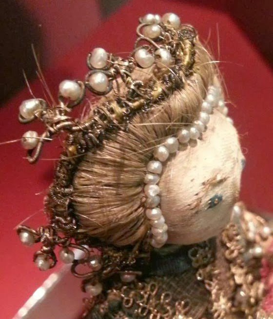 Coiffure de poupée en cheveux naturels, photo