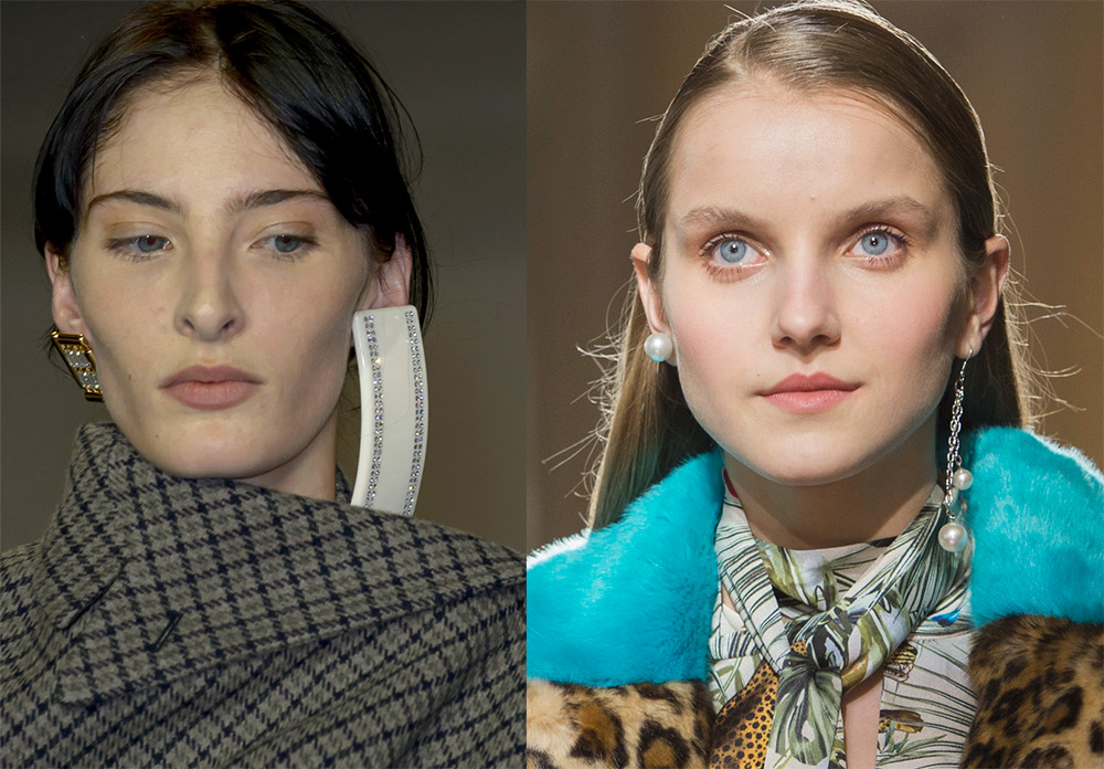 Différentes boucles d'oreilles dans une paire